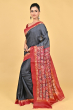 BLACK TUSSAR PRINTED BATIK SAREE